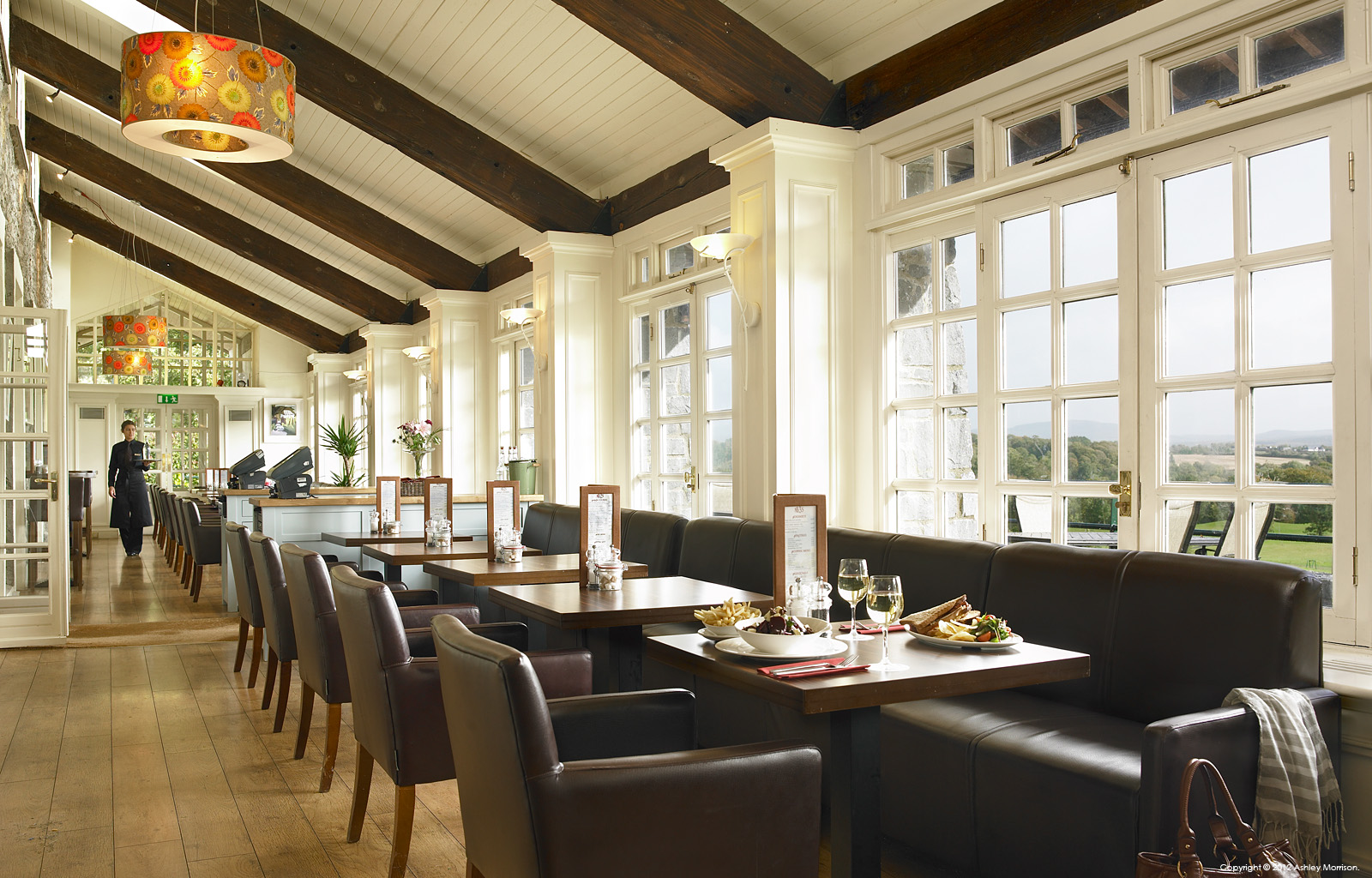 The conservatory restaurant in the Clubhouse at Mount Juliet Country Estate in County Kilkenny by Ashley Morrison.
